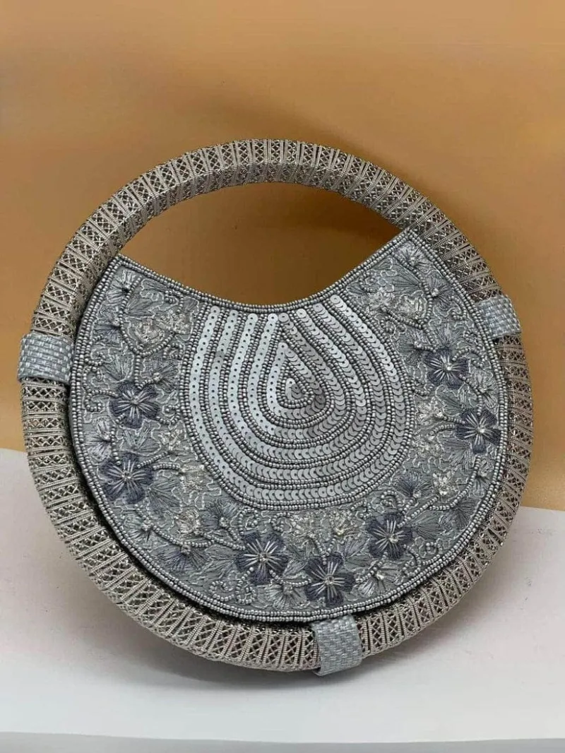 Unique Shaped Circular Whirl Handbag with Intricate Embroidery view 2