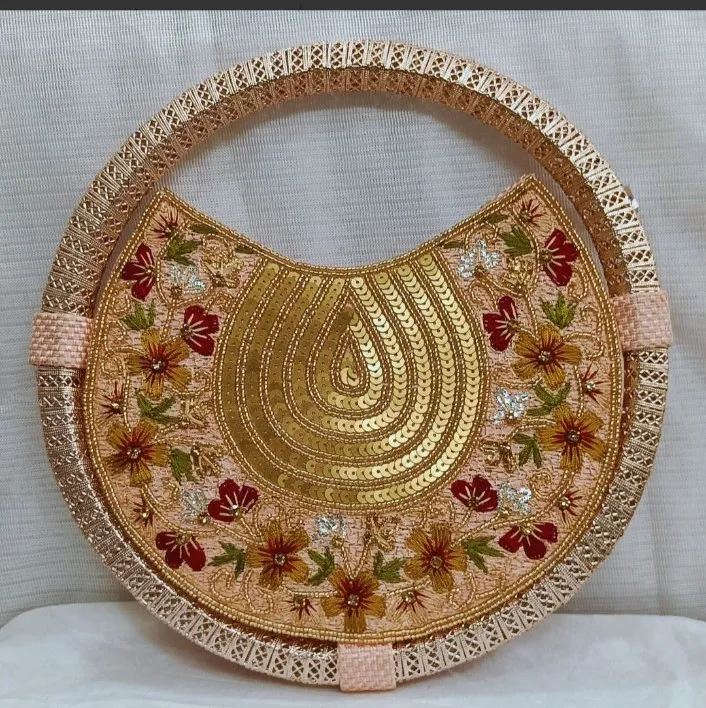 Unique Shaped Circular Whirl Handbag with Intricate Embroidery view 4
