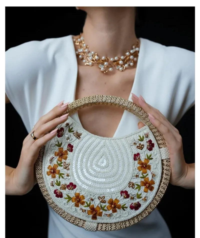 Unique Shaped Circular Whirl Handbag with Intricate Embroidery
